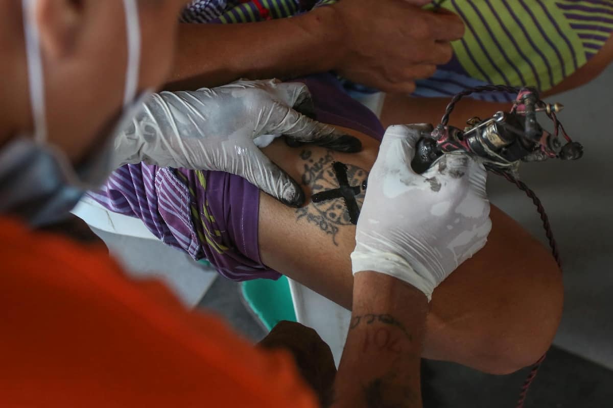 Philippine inmates X over gang symbols [Ron LOPEZ | AFP]