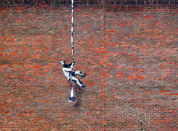 For art sake: Secretive artist Banksy pledges millions to save a prison