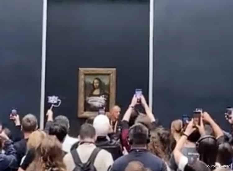 Watch: Mona Lisa painting smeared with cake by climate change activist