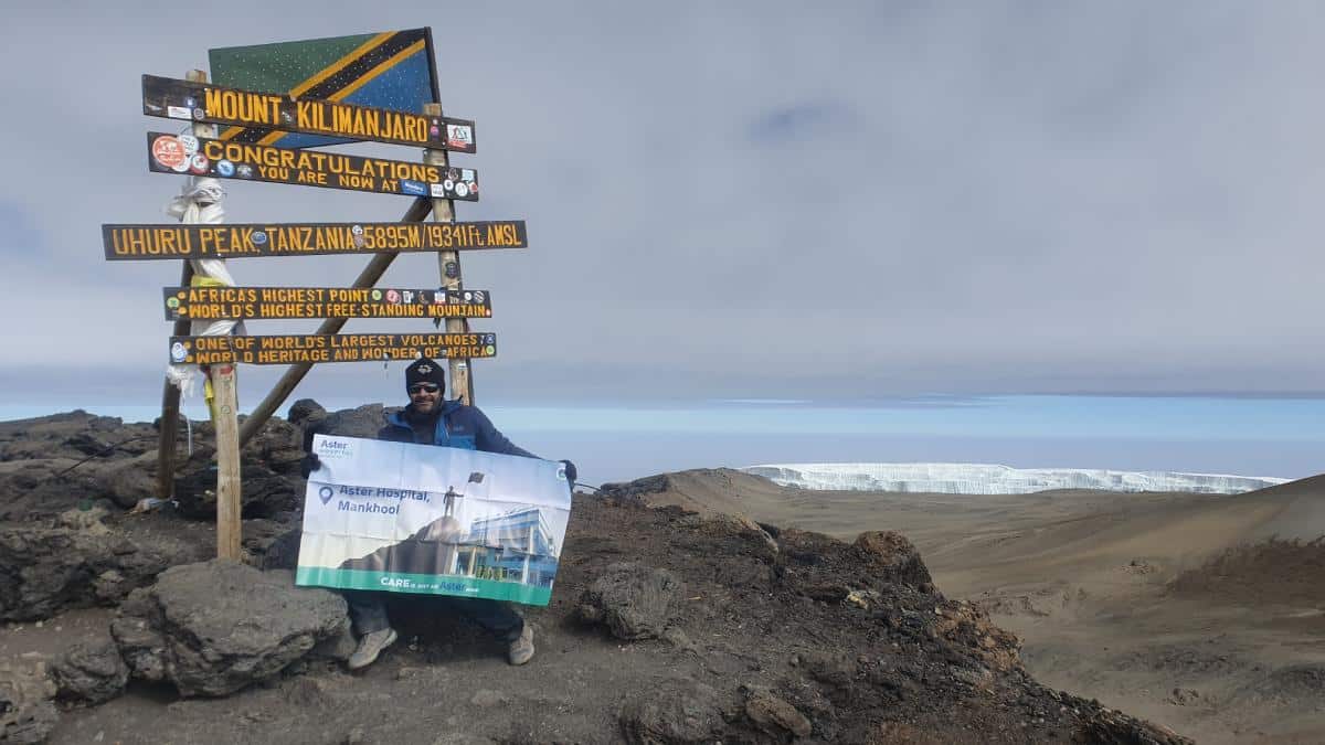 Dr. Mustafa Saif at the peak of Mt Kilimanjaro at 5,895 meters above the sea level