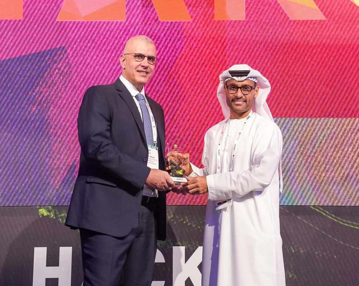 Ned Baltagi of SANS Institute receiving the award from H.E Dr. Mohamed Al Kuwaiti, Head of Cybersecurity, UAE Government at GISEC Global 2023