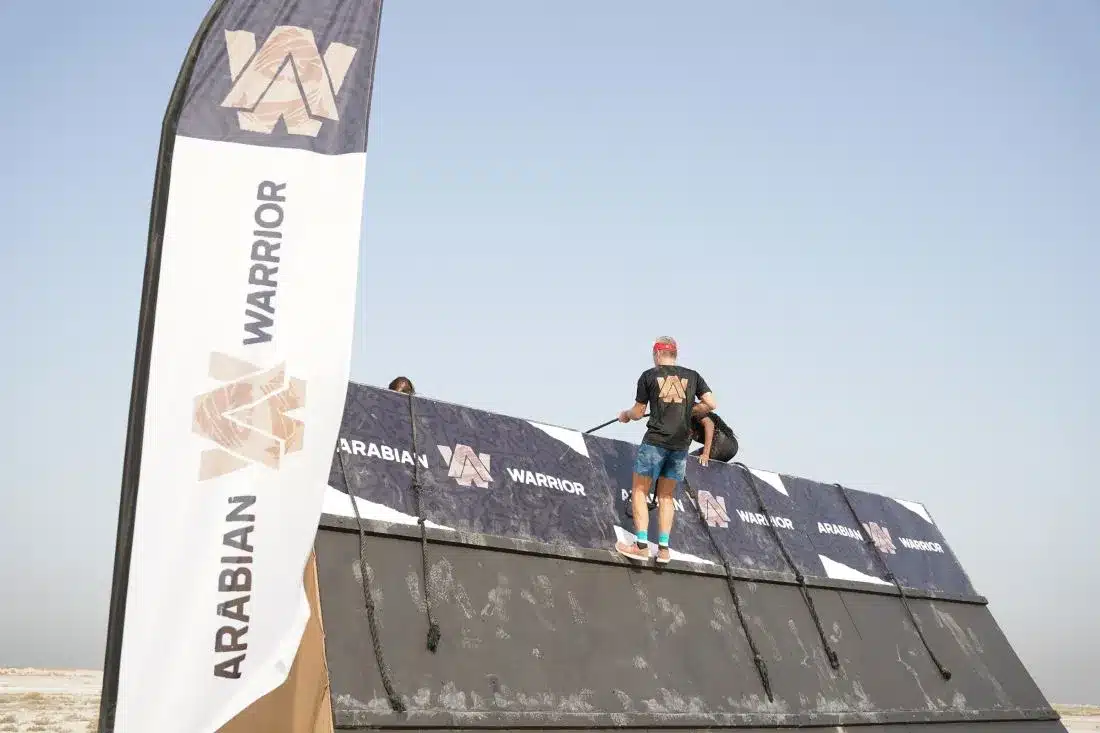 Group Completing Obstacle - ARABIAN WARRIOR DEBUTS WITH FIRST-EVER RACE IN DUBAI