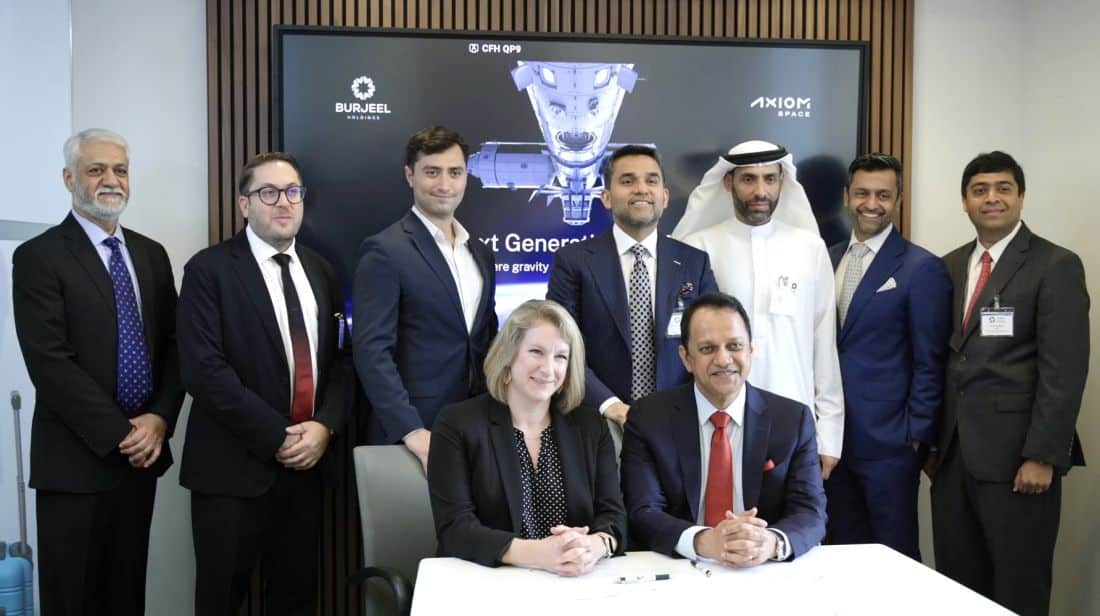 Mr. John Sunil, and Dr. Lucie Low, signing the MoU in the presence of Dr. Shamsheer Vayalil, in New York
