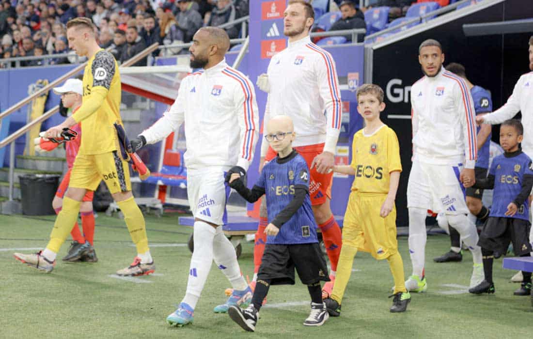Emirates player escort experience delights 23 Lyon children