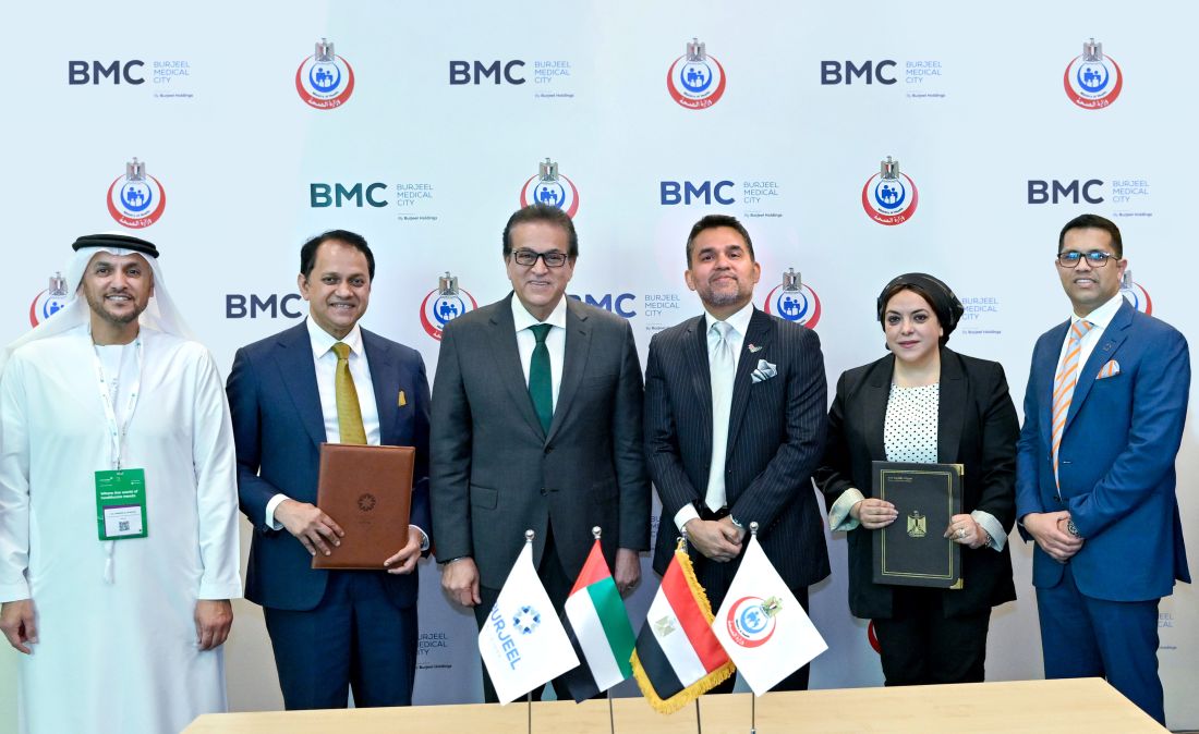 H.E. Khaled Abdel Ghaffar, and Dr. Shamsheer Vayalil, during the MoU signing, alongside officials