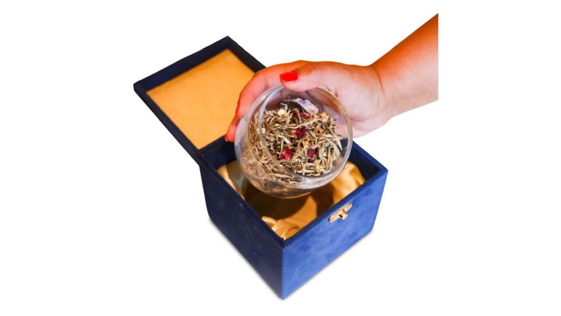 Gold Reserve Tea by sy’a redefines tea rituals with 24K edible gold flakes, lotus petals, and white tea leaves, merging luxury and wellness.