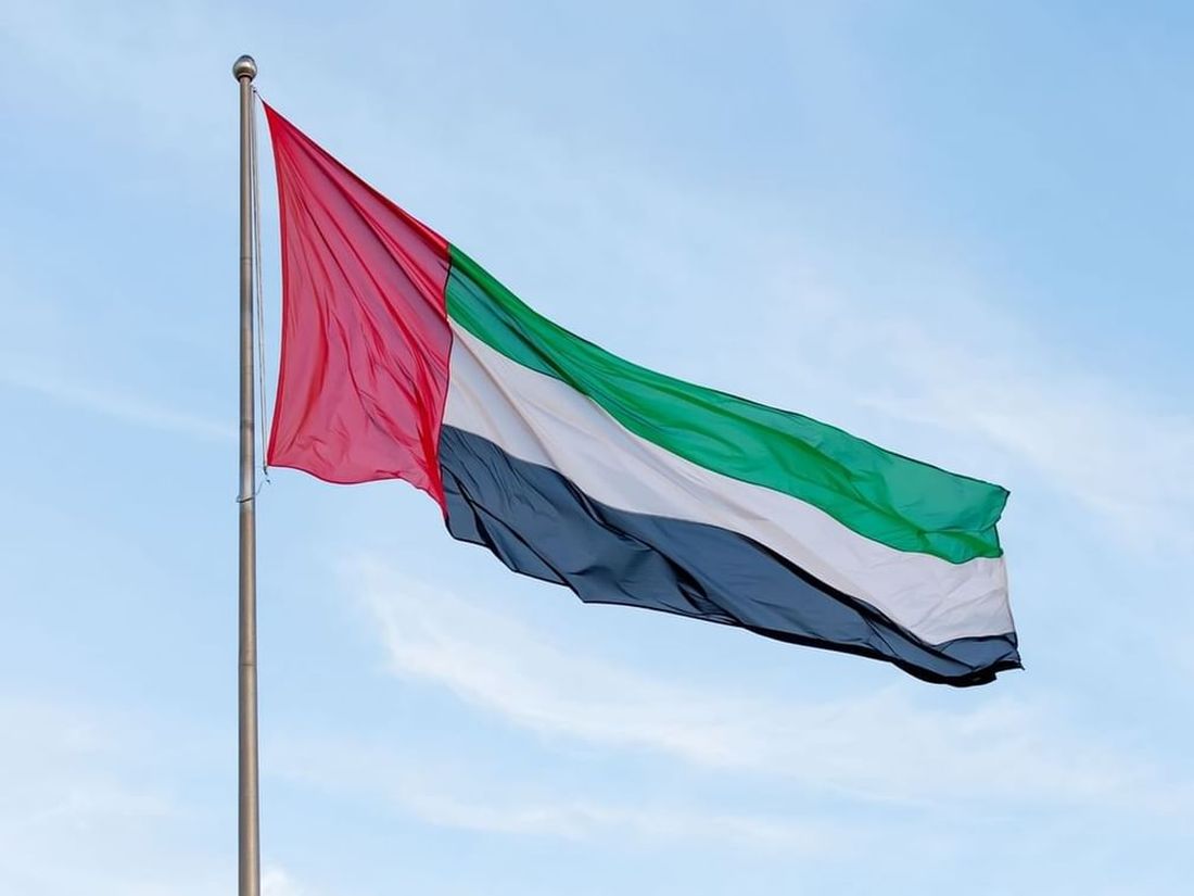 UAE Flag in Blue Background